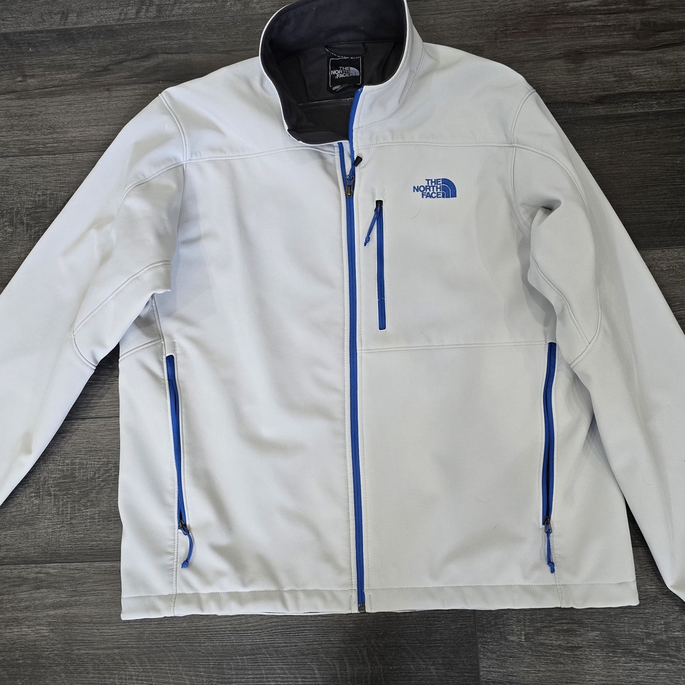 The North Face White Jacket with Blue Accents